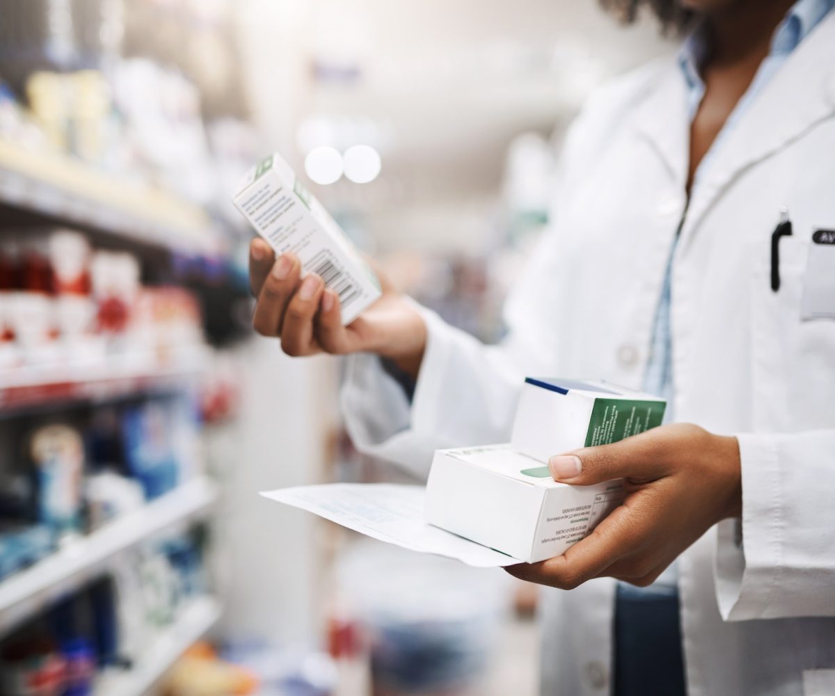 Cropped shot of an unrecognizable young female pharmacist working in a pharmacy